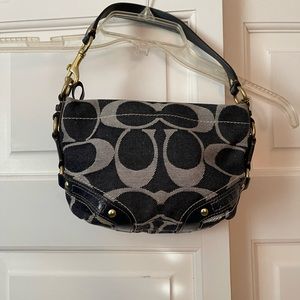 Used Coach Carly bag. Blue denim signature canvas bag. In good condition